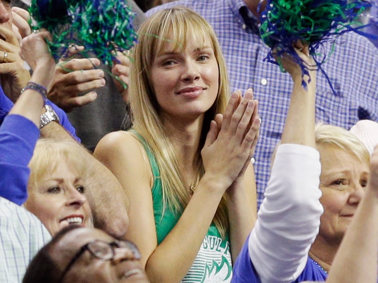 Amanda Marcum, the wife of head coach Andy Enfield of the Florida Gulf Coast Eagles, watches in the second half against the San Diego State Aztecs dur...