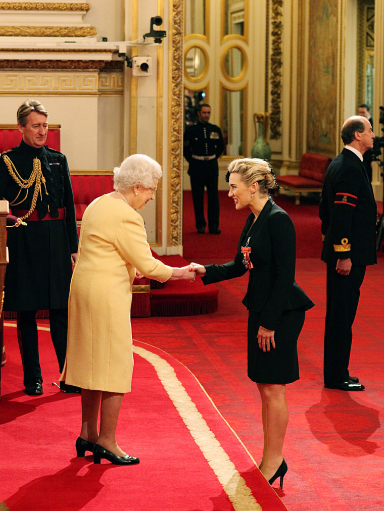 Actress Kate Winslet is awarded a CBE, for services to drama by Queen Elizabeth II during a ceremony at Buckingham Palace on November 21, 2012.