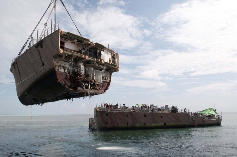 March 26: The bow is raised by a crane on the M/V Jascon 25.