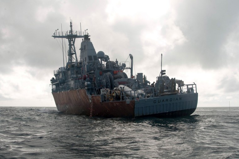 Feb. 8, 2013: The USS Guardian sits aground on Tubbataha Reef in the Sulu Sea 22 days after it was grounded.