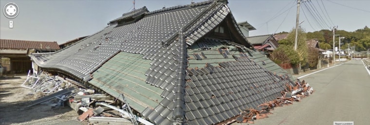 A crushed building in Namie, a nuclear no-go zone where former residents have been unable to live since they fled from radioactive contamination near the Fukushima Daiichi nuclear power plant two years ago.