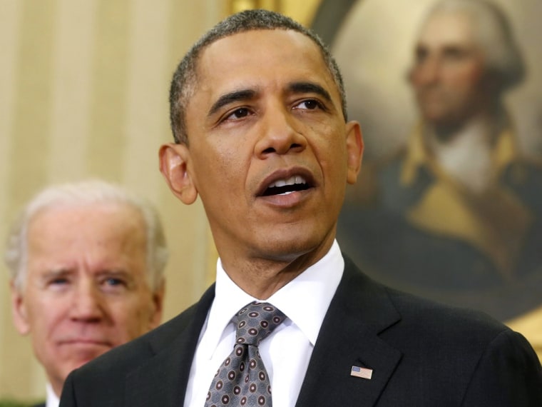 Vice President Joe Biden listens as President Barack Obama talks in the Oval Office of the White House, March 27, 2013.
