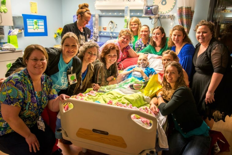 Katelyn surrounded by her Children's Hospital nurses.