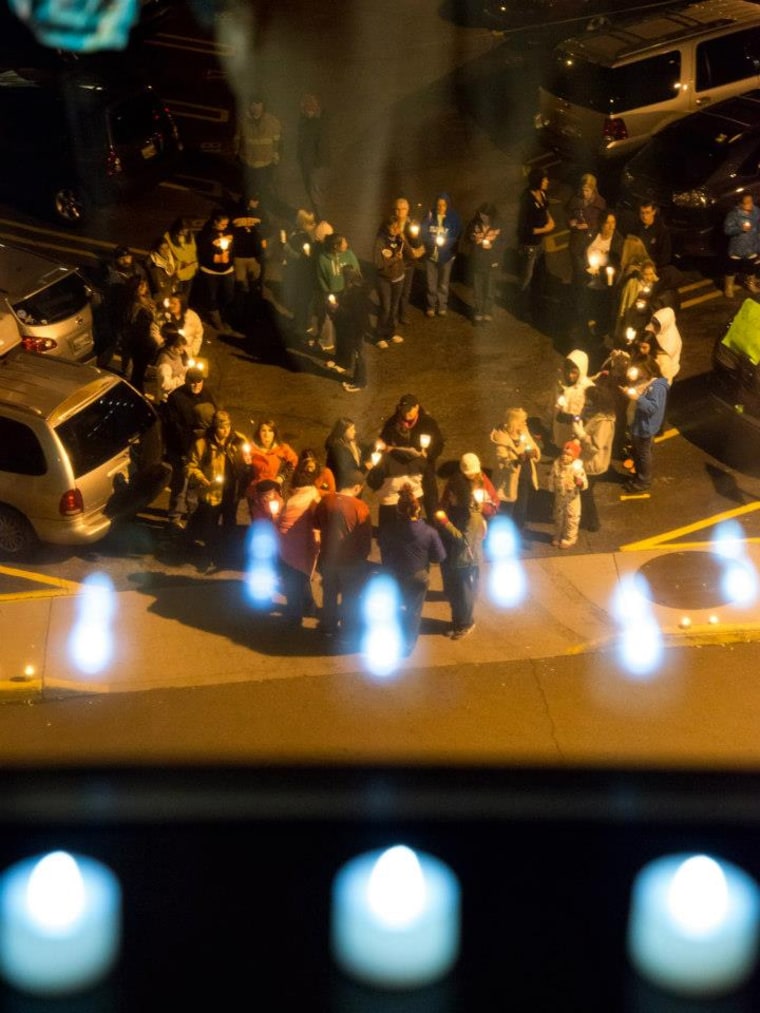 The view outside Katelyn's window- Candelight vigil in her honor.