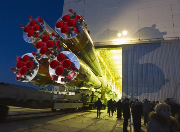 The Soyuz TMA-08M spacecraft is transported from its assembly hangar to the launch pad at the Baikonur Cosmodrome on March 26.