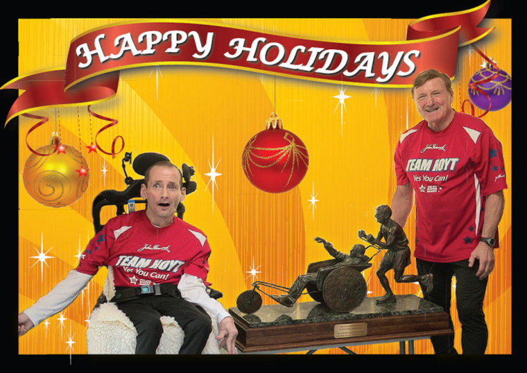 Dick and Rick Hoyt were so excited about their bronze statue that they featured the miniature version of it prominently in their 2012 holiday card.