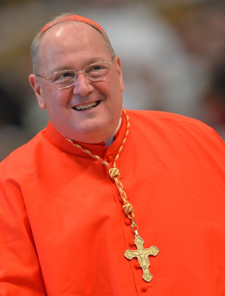 U.S. Cardinal Timothy Dolan attends a mass at the St Peter's basilica before the papal conclave in this March 2013 file photo.