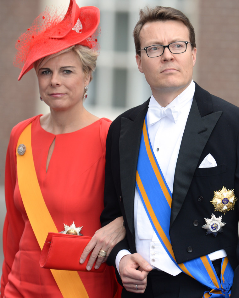 Prince Constantijn of the Netherlands and his wife Princess Laurentien leave the Nieuwe Kerk (New Church) in Amsterdam on April 30, 2013 after attendi...