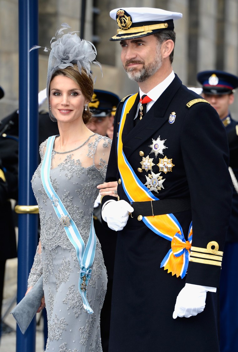AMSTERDAM, NETHERLANDS - APRIL 30:  Princess Letizia of Spain and Prince Felipe of Spain depart the Nieuwe Kerk to return to the Royal Palace after th...