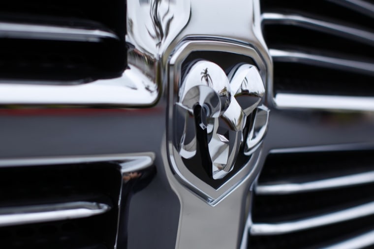 The logo on the front of a Dodge RAM truck is seen at a Chrysler dealership in Carlsbad, California April 29, 2013.