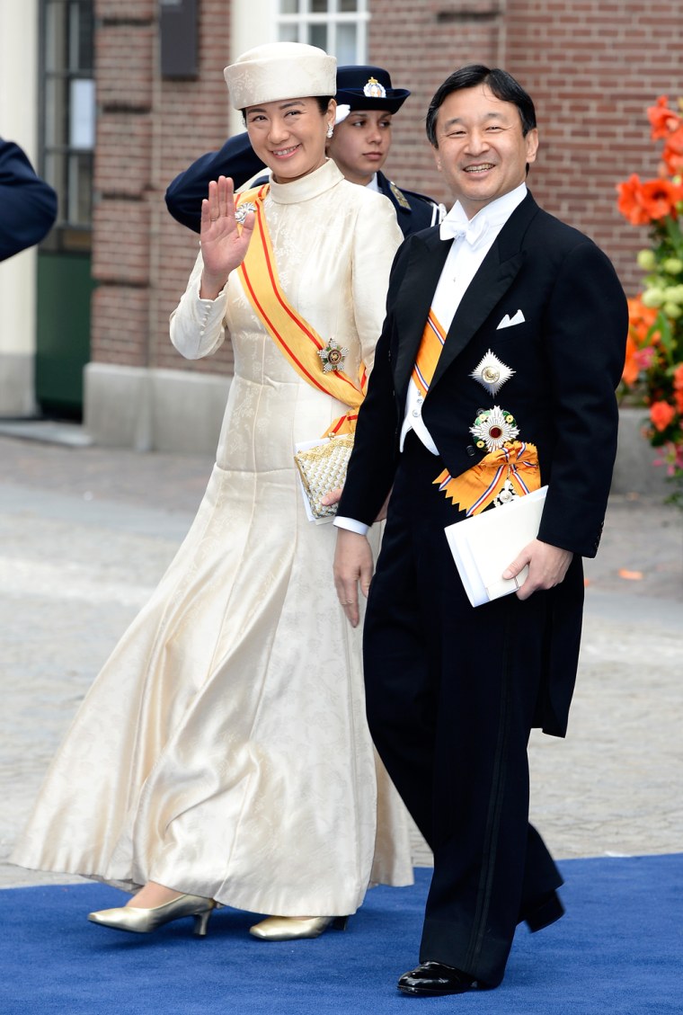 AMSTERDAM, NETHERLANDS - APRIL 30:  Crown Prince Naruhito and Crown Princess Masako of Japan depart the Nieuwe Kerk to return to the Royal Palace afte...