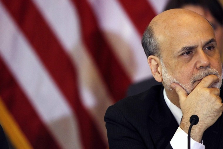 In this file photo, Chairman of the Federal Reserve Bank Ben Bernanke attends the Treasury Department's Financial Stability Oversight Council in Washi...