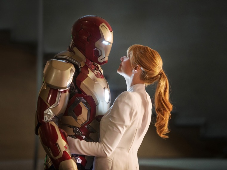 Robert Downey Jr. (in Iron Man suit) with Gwyneth Paltrow as Pepper Potts in