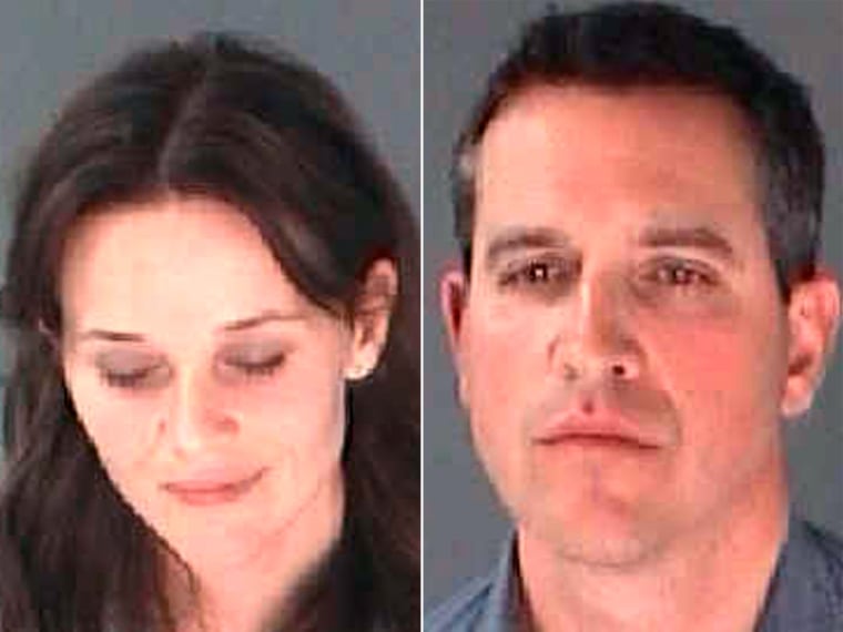 Reese Witherspoon and James Toth in mugshots taken after their Atlanta arrest.