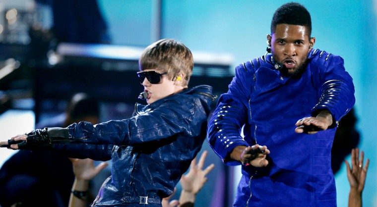 Justin Bieber and Usher at the 2011 Grammy Awards.