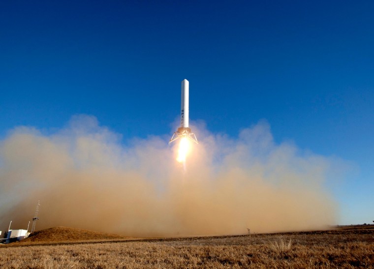 SpaceX's Grasshopper vertical takeoff and landing test vehicle (VTVL) takes a 131-foot (40 meter) test flight at the company's rocket testing facility in McGregor, Texas, in December 2012..