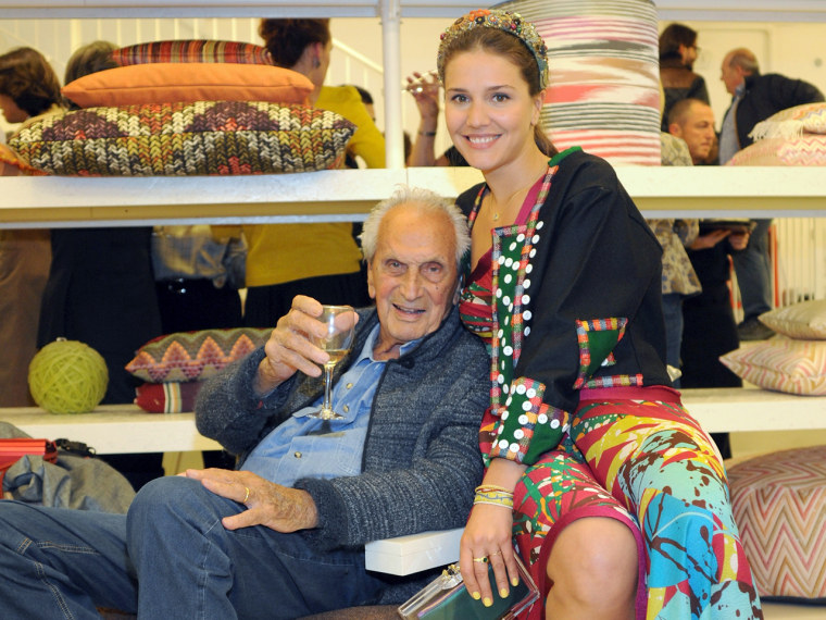 Ottavio Missoni, co-founder of the colourful fashion brand Missoni, has passed away peacefully at home in Sumirago, Italy aged 92. Pictured: Ottavio Missoni and granddaughter Margherita Missoni during Milan Design Week on April 16, 2012 in Milan, Italy.