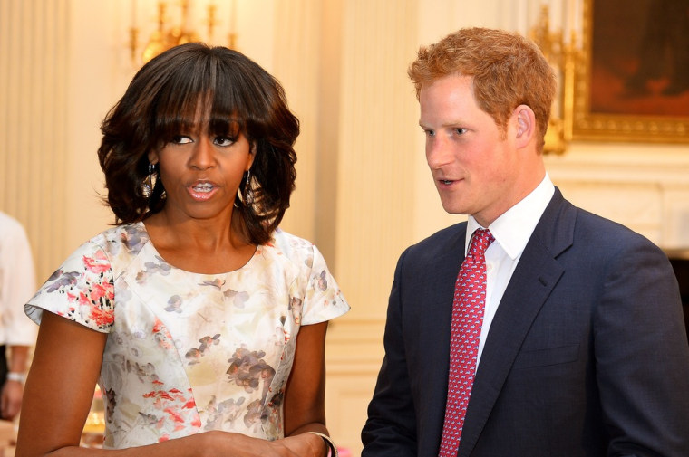 WASHINGTON, DC - MAY 09:  HRH Prince Harry and first lady Michelle Obama meet at the White House during the first day of his visit to the United State...