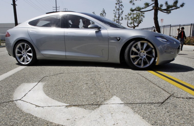 Electric Car Maker Tesla Defies Skeptics