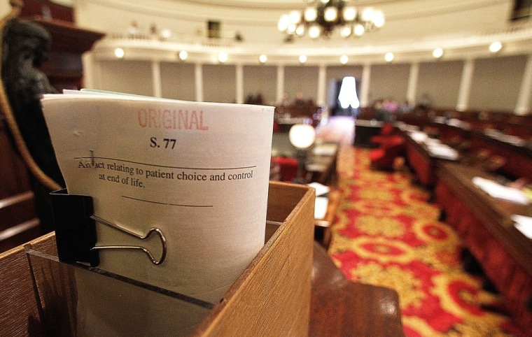 The Senate bill sits on the speaker's podium on Monday in Montpelier, Vt.