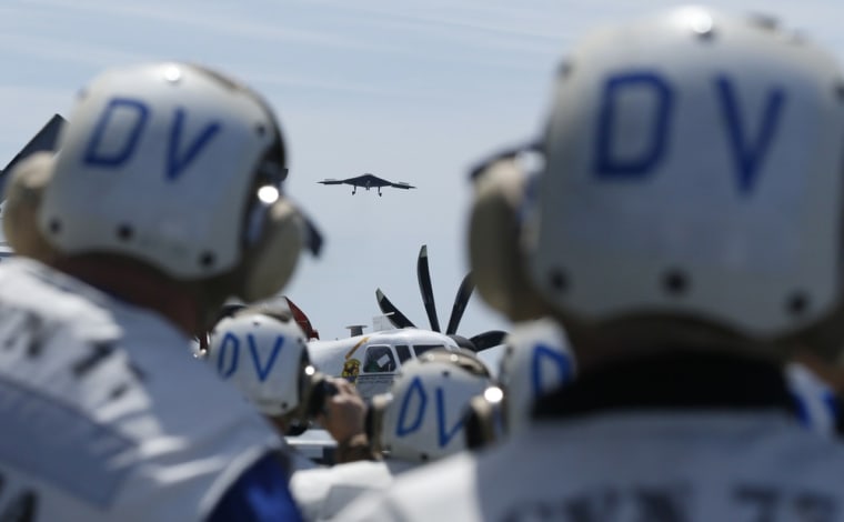 An X-47B performs a fly-by after being launched for the first time off an aircraft carrier in the Atlantic Ocean off the coast of Virginia, on May 14.