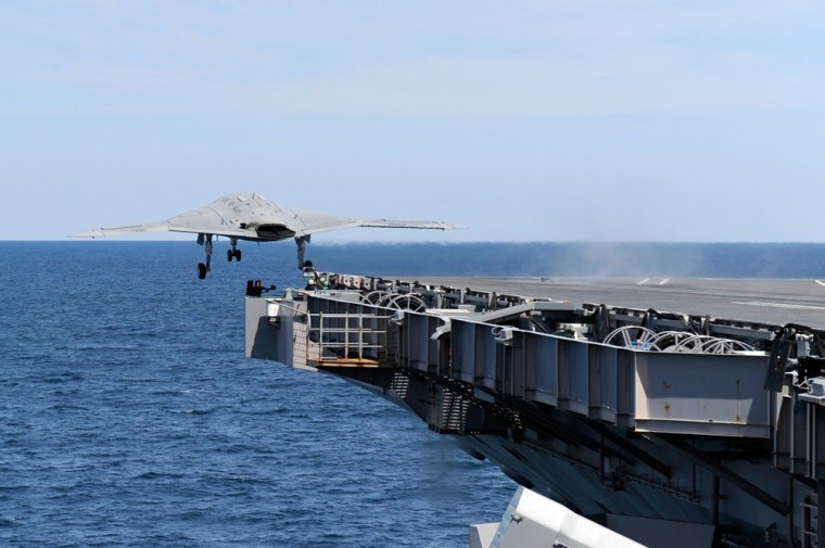 An X-47B Unmanned Combat Air System (UCAS) demonstrator is launched from the deck of the aircraft carrier USS George H.W. Bush during flight operations in the Atlantic Ocean on May 14.
