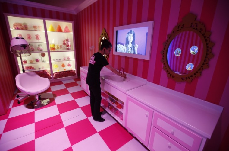 Visitors to the Barbie Dreamhouse in Berlin can try on her clothes.