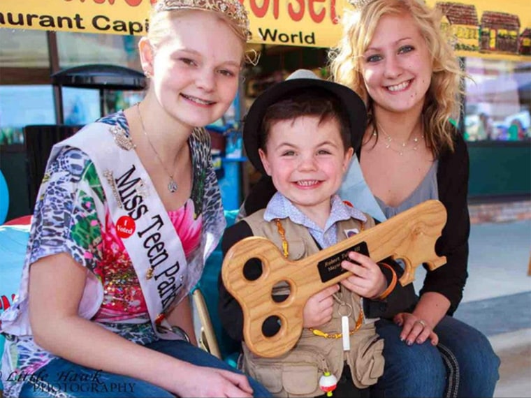 Bobby Tufts, the 4-year-old honorary mayor of Dorset, Minn., was given an oak plaque symbolizing the key to the city.