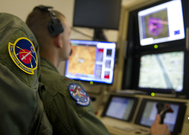 pilot trainee flies an MQ-1 Predator simulator mission at Holloman Air Force Base in New Mexico