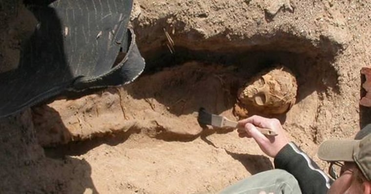 Here, the burial site of a child found in an 1,800-year-old cemetery at the Dakhleh Oasis in Egypt.