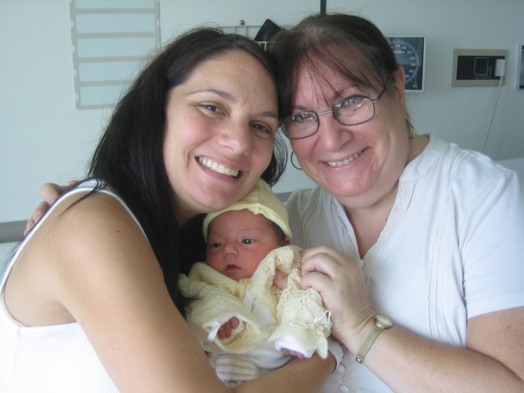 Wendy Bradford, her mom Marsha Freeman, and daughter Molly in the hospital just after Molly's birth.