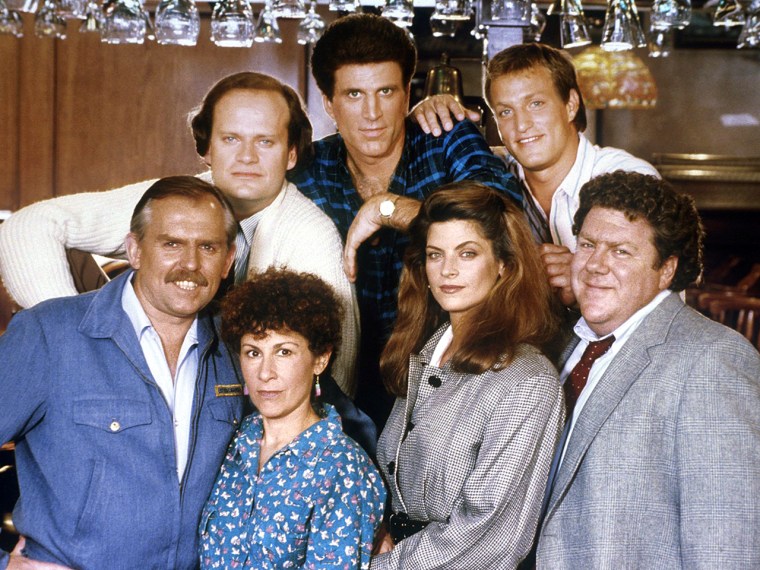 Kelsey Grammer as Dr. Frasier Crane, Ted Danson as Sam Malone, Woody Harrelson as Woody Boyd, John Ratzenberger as Cliff Clavin, Rhea Perlman as Carla Lozupone Tortelli LeBec, Kirstie Alley as Rebecca Howe, George Wendt as Norm Peterson in \"Cheers.\"