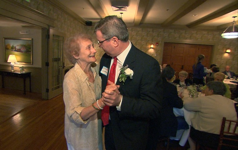 Grace Duffy dances with her stand-in date Dave Lenahan at the Hillhouse High School class of 1943 reunion and prom.