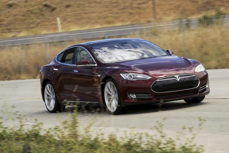 A Tesla Model S electric sedan is driven near the company's factory in Fremont, California, in this June 22, 2012, file photo. Tesla Motors Inc Chief ...