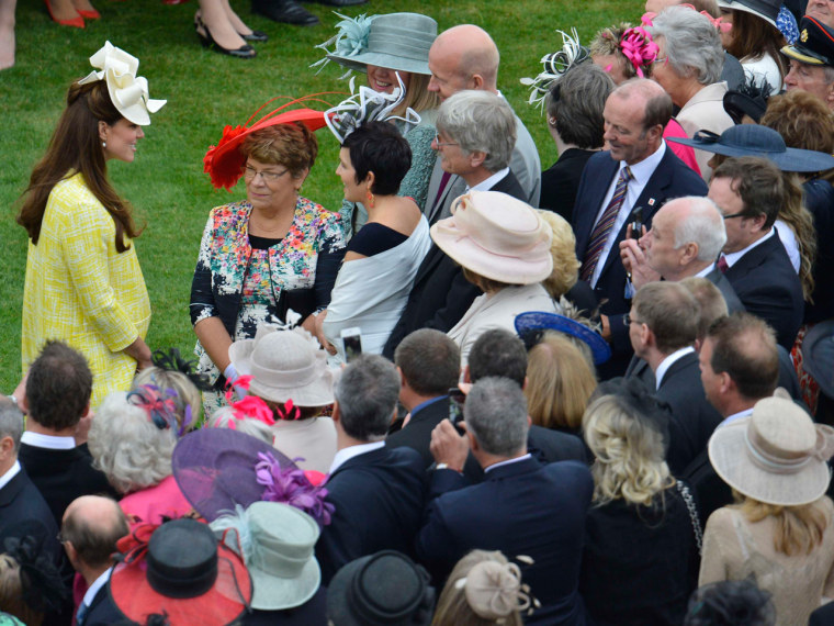 Duchess Kate attends a garden party at Buckingham Palace in London.