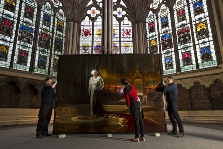 Image: Conservator Krista Blessley conducts a condition report on a portrait of Queen Elizabeth II