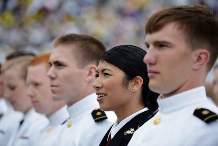 Graduates listen as President Barack Obama delivers the commencement address during the Naval Academy graduation ceremony.