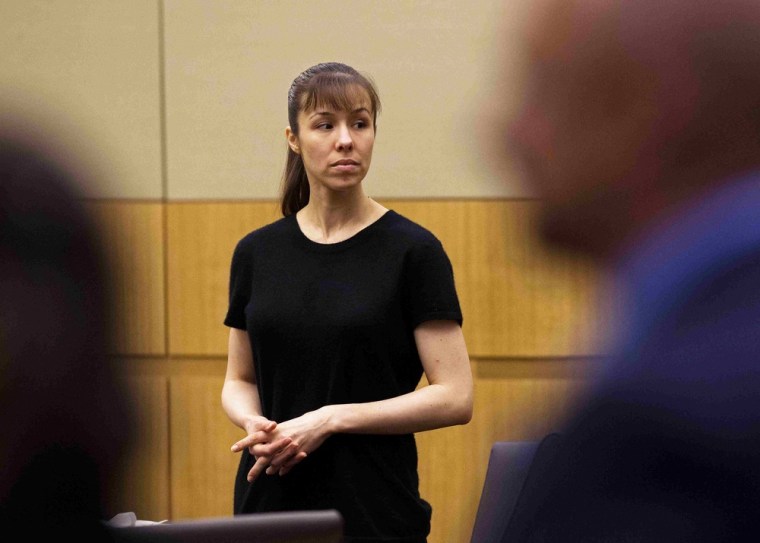 Jodi Arias stands as the jury enters the courtroom during the penalty phase of her murder trial at Maricopa County Superior Court in Phoenix, Ariz., May 22, 2013.