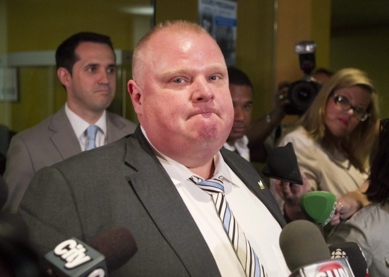 Toronto Mayor Rob Ford speaking to reporters Monday, May 27, after the resignations of his two top communications aides.