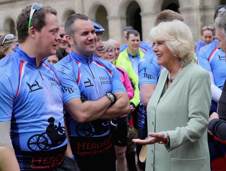 Camilla, Duchess of Cornwall talks with Help For Heroes fundraisers taking part in the Big Battlefield Bikeride at Les Invali...