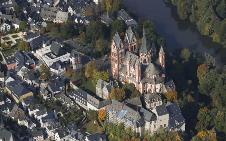 An aerial view shows Limburg cathedral, right, and to the left the ensemble of the bishop of Limburg's residence along the river Lahn. German Catholic bishop Franz-Peter Tebartz-van Elst, under fire for huge cost overruns on the luxury residence.