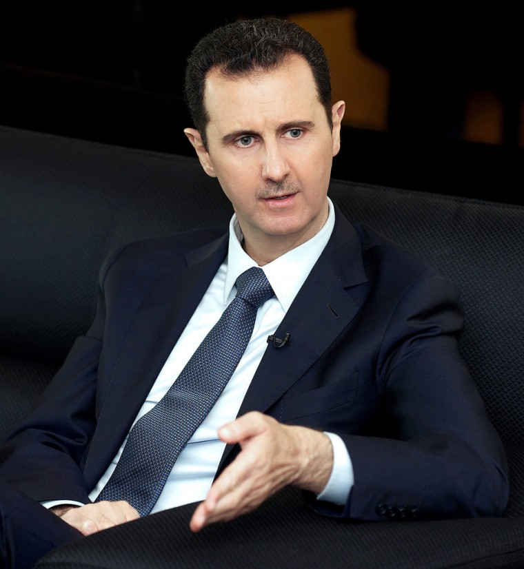 Syrian President Bashar Assad speaks during an interview with the German magazine Der Spiegel in Damascus, Syria, Oct. 2, 2013.