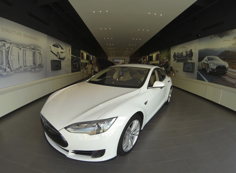 A Tesla Model S electric car is on display at a Tesla store in a shopping mall in La Jolla, Calif., on Sept. 6.