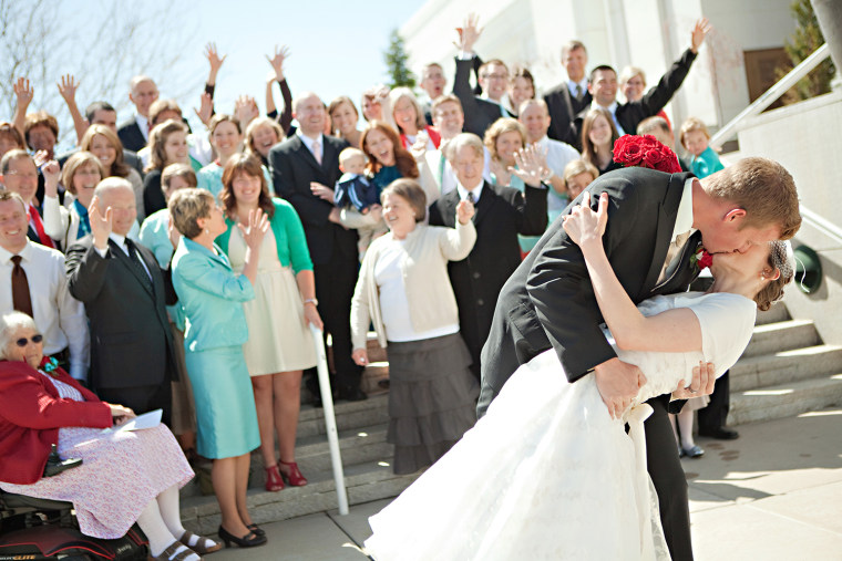 Kim and Seth kiss on their wedding day.