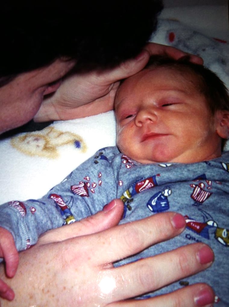 Susan Macdonald holds her son Michael