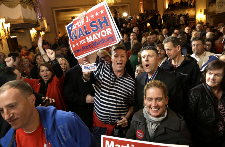 Supporters in Boston celebrate returns that elected state Rep. Marty Walsh as the next mayor Tuesday night.