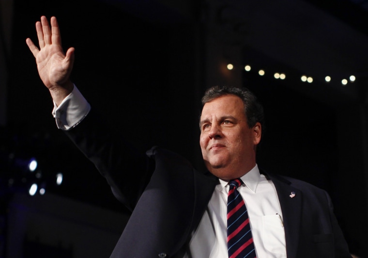 New Jersey Governor Chris Christie waves to supporters after celebrating his election night victory in Asbury Park, New Jersey November 5, 2013.