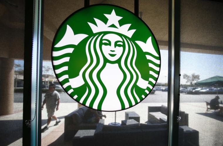 Starbucks says it plans to hire 10,000 military veterans and active military spouses in the next five years.