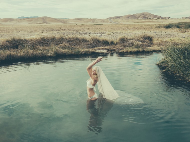 Image: Model wearing a Mara Hoffman bridal bikini in the water