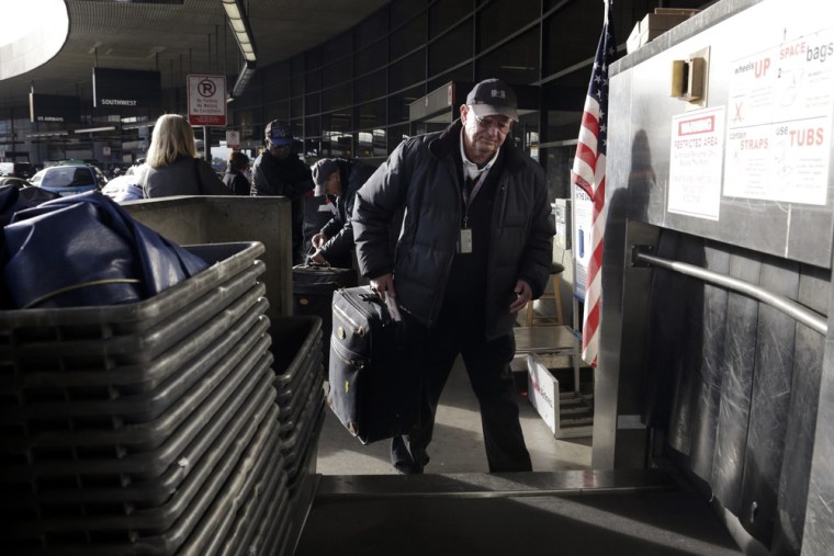 Voters in the working-class Seattle suburb of SeaTac, which encompasses the region's main airport, cast ballots Tuesday on whether to enact one of the country's highest minimum wages in a ballot measure supporters hope will serve as a model for similar efforts elsewhere.